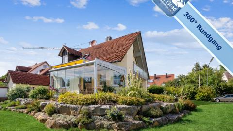 Das exklusiv von PlanetHome angebotene Einfamilienhaus mit hochwertigem, nach Süden ausgerichtetem Wintergarten